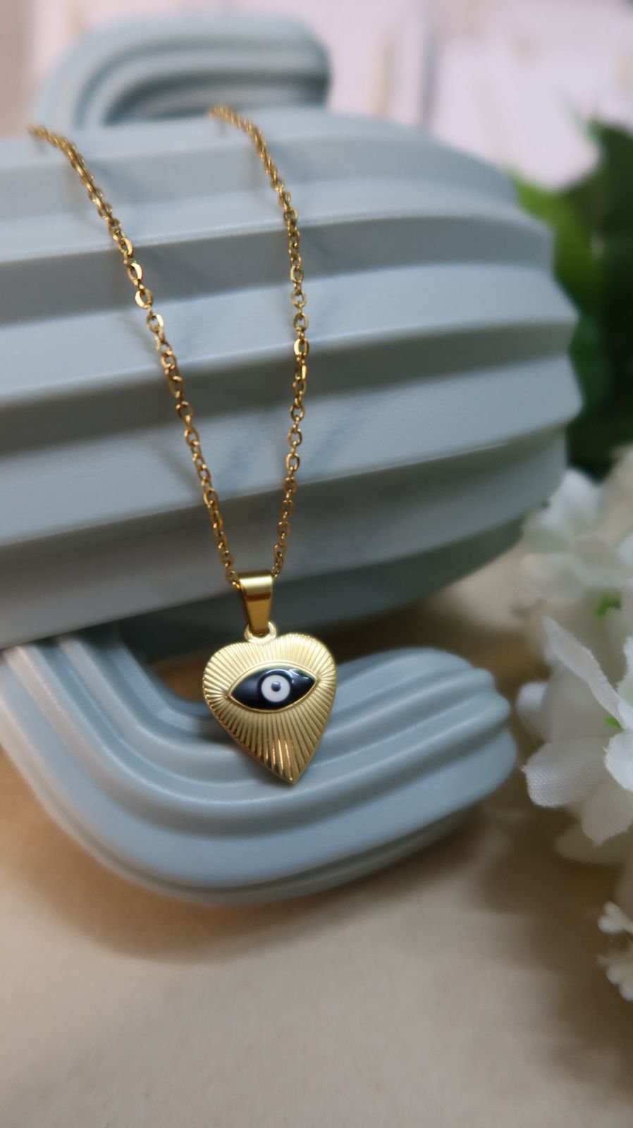 Evil eye charm pendant
