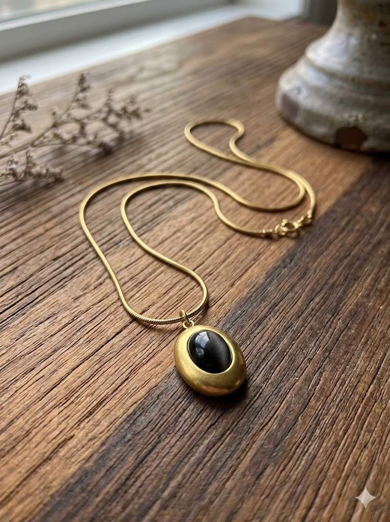 oval cat eye pendant black