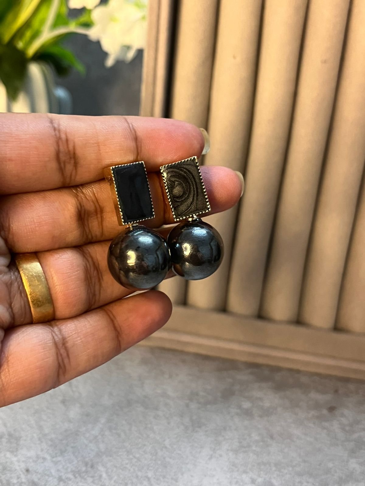 Black ball statement earrings