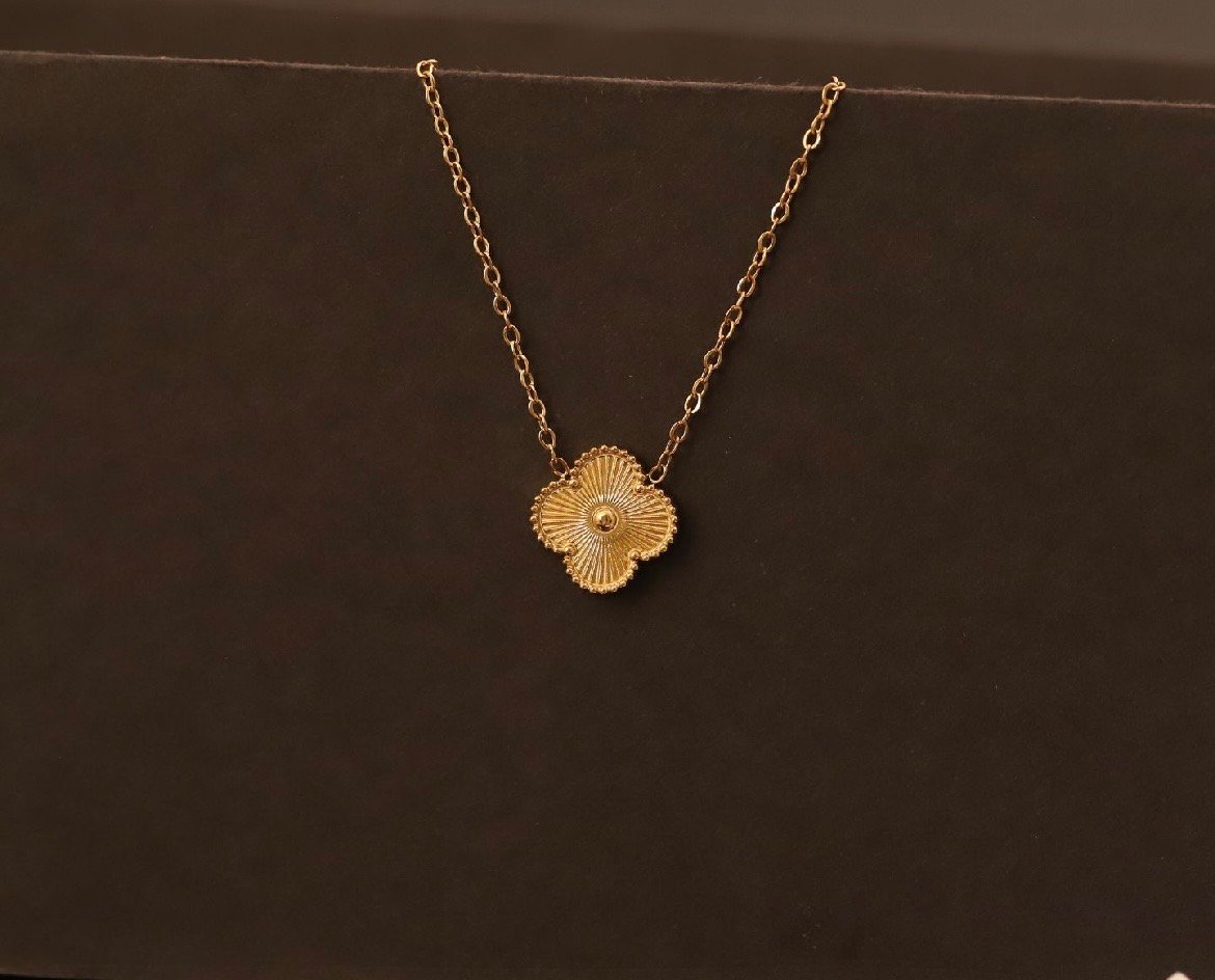 Golden clover pendant for women